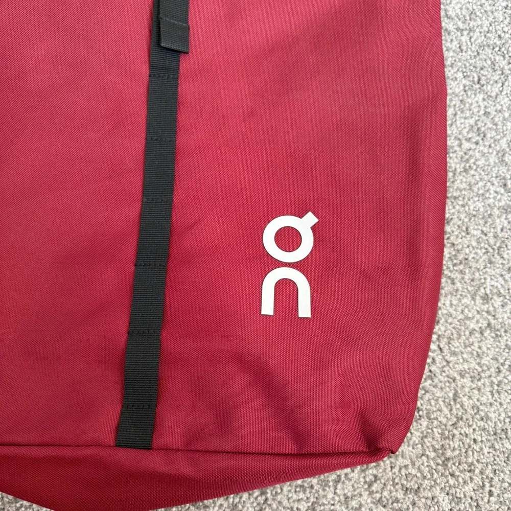 On Running ambassador Roll Top Backpack Burgundy adjustable strap